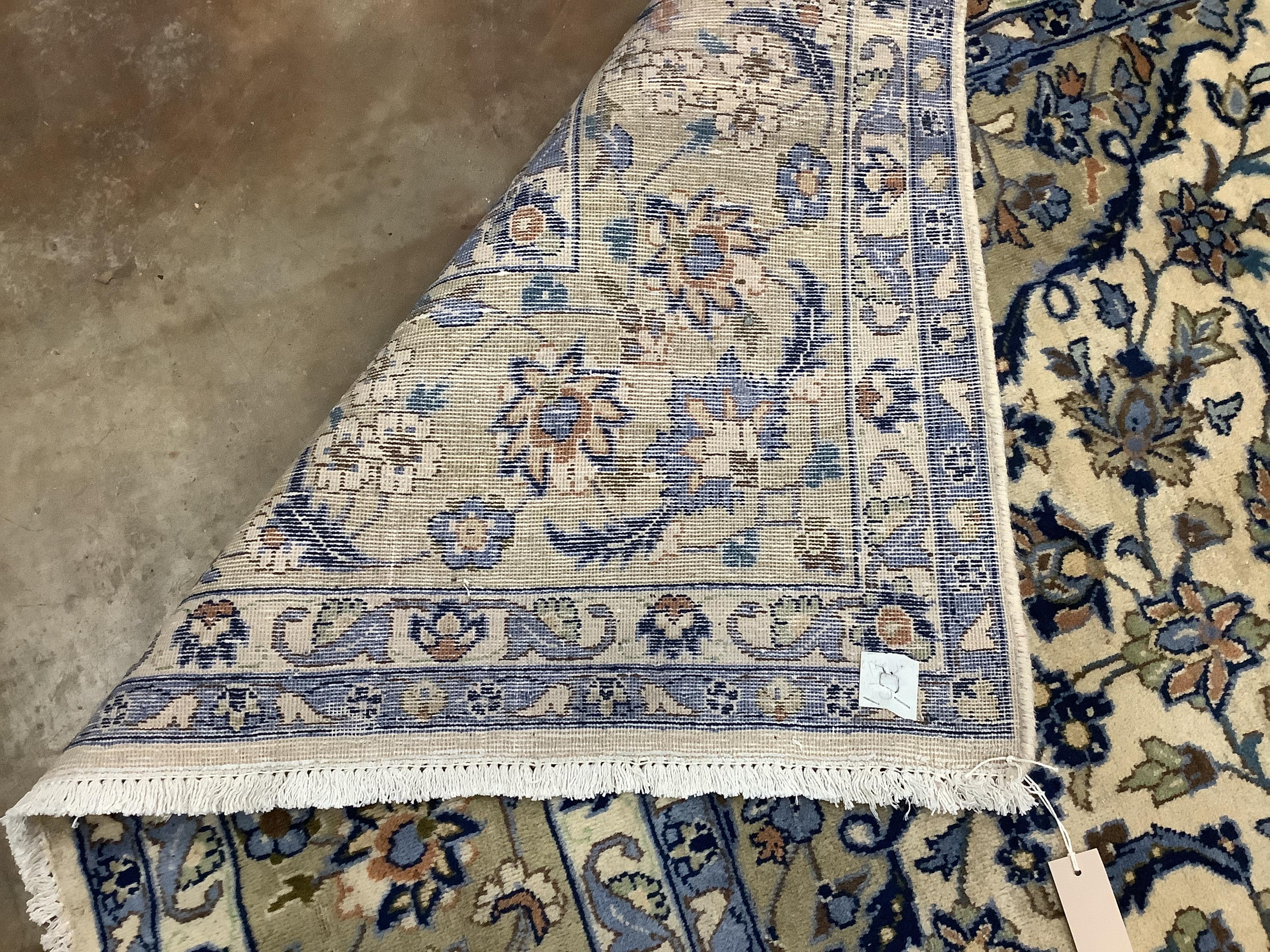 A Najaf Abad ivory ground carpet, 340 x 240cm